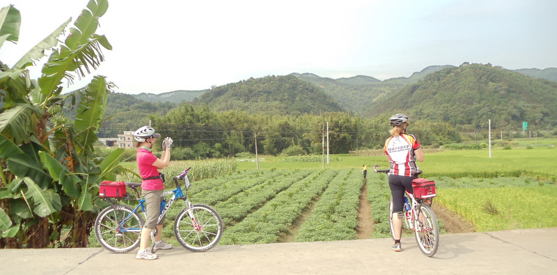 Sharon and Regina soak in South China; Bike Tour, October, 2010.